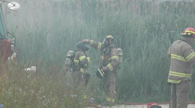 City firefighters douse encampment fire near elevators