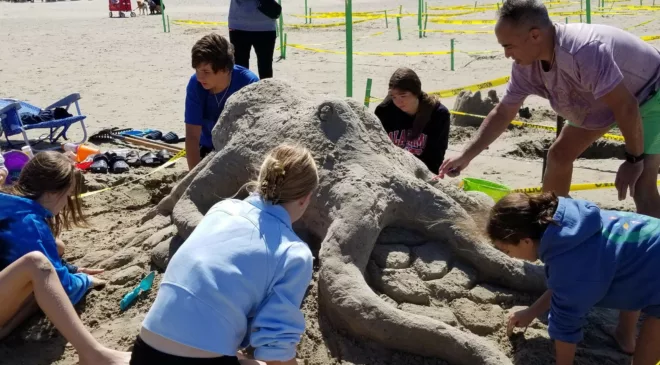 A little windy but Sandfest sculptors turn out anyway